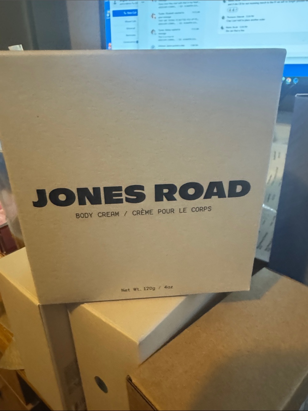 Jones Road Body Cream in Neutral Tan Box with Black Text